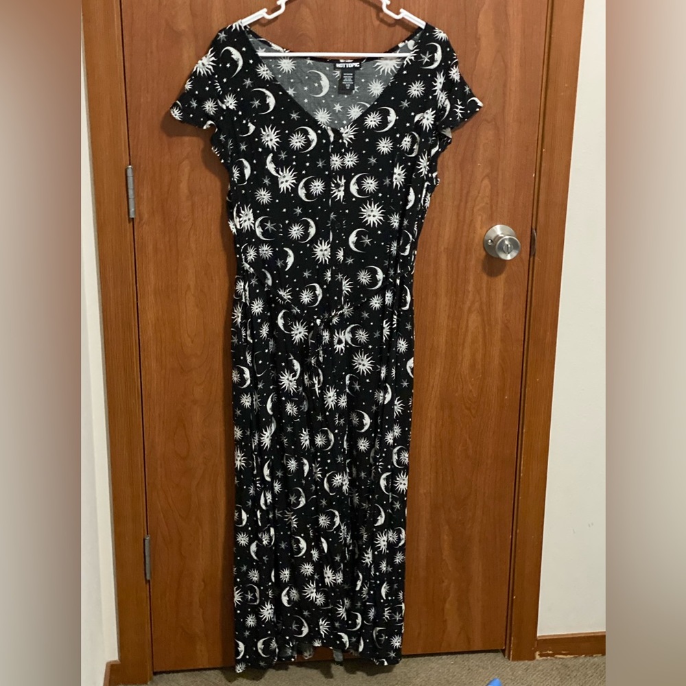 Black moon/sun patterned flowy dress.